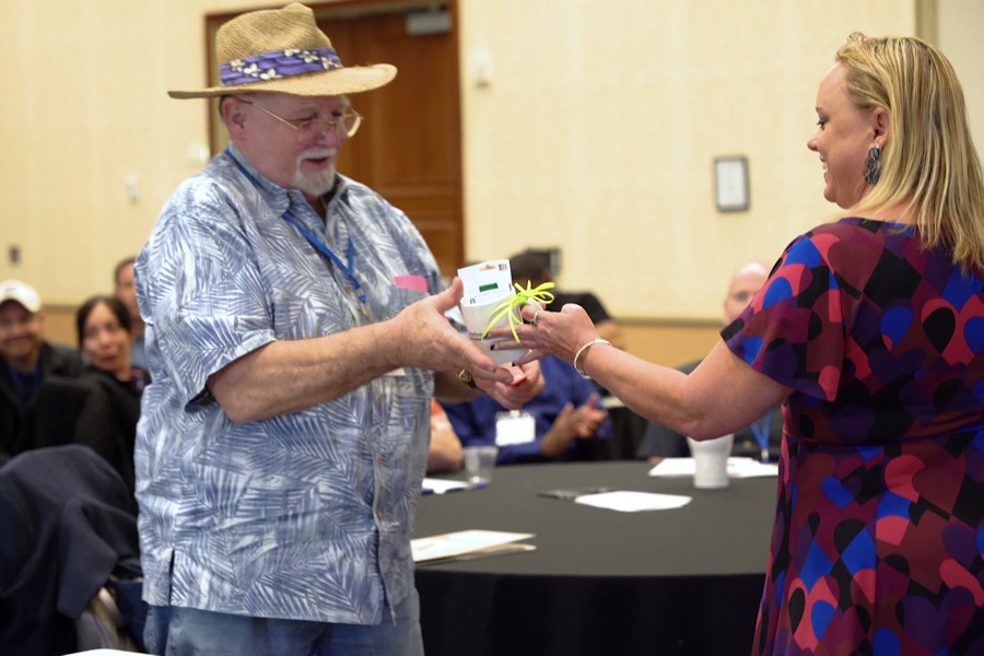 Prize handoff at happy hour